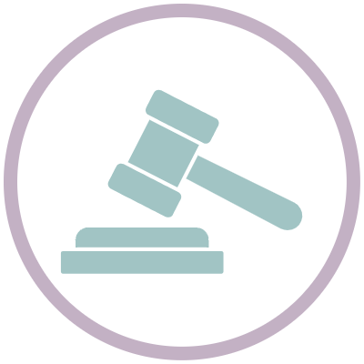 A gavel striking a sounding block, symbolising judgment or authority.