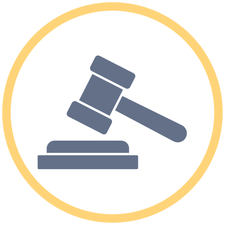 A gavel striking a sounding block, symbolising judgment or authority.