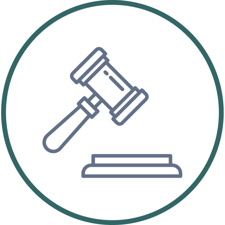 A gavel striking a sounding block, symbolising judgment or authority.